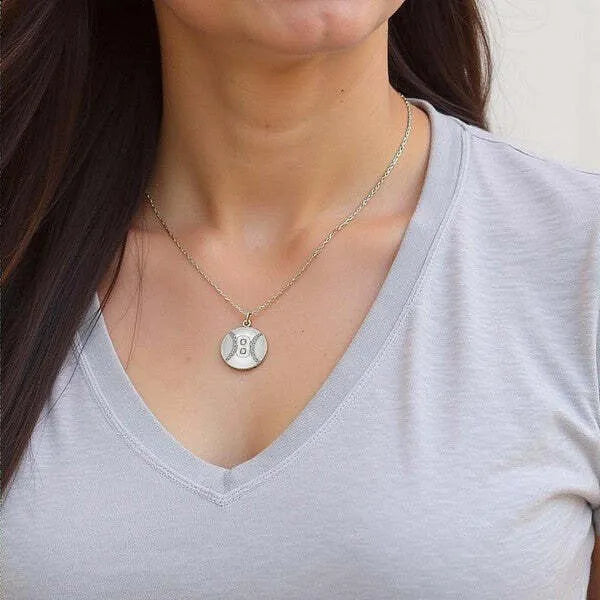 Baseball pendant worn by woman in sterling silver