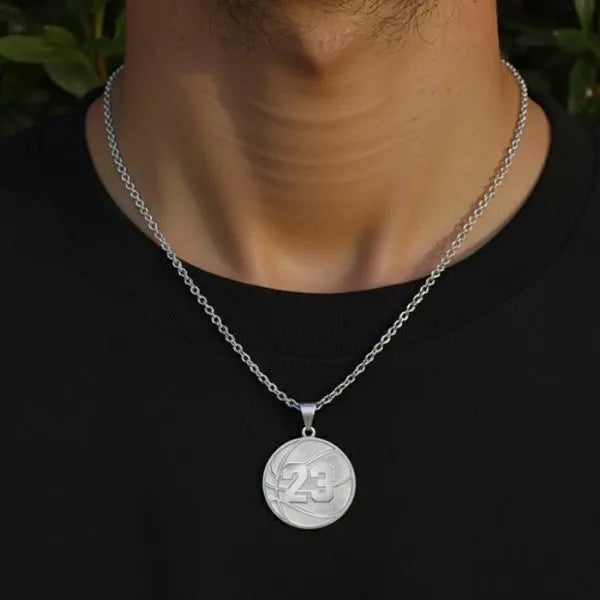 White gold basketball pendant worn by man