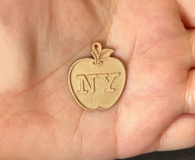 Laser Cutting & Engraving: Bringing the Big Apple to Life in Gold