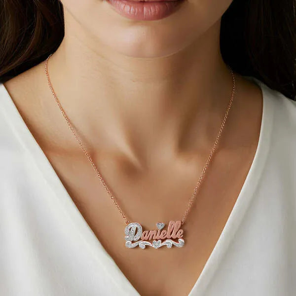 Rose gold Danielle polished name necklace worn on model