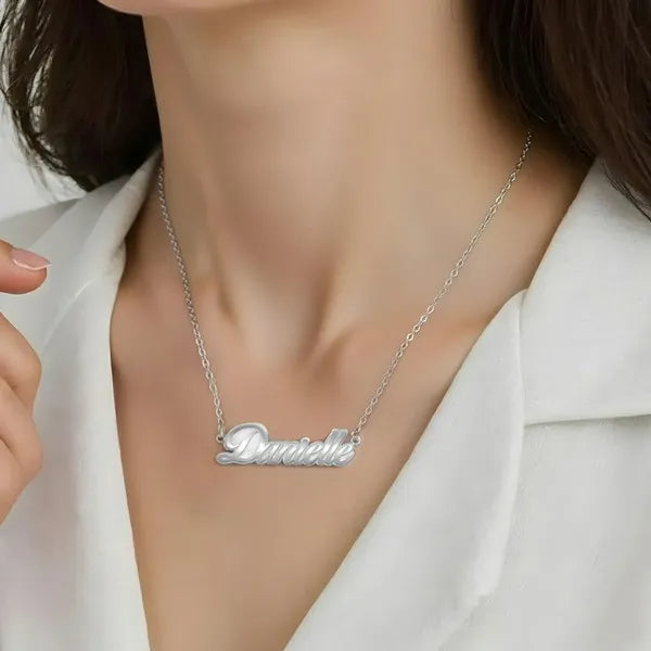Styled Danielle 14 karat fancy script name necklace white gold