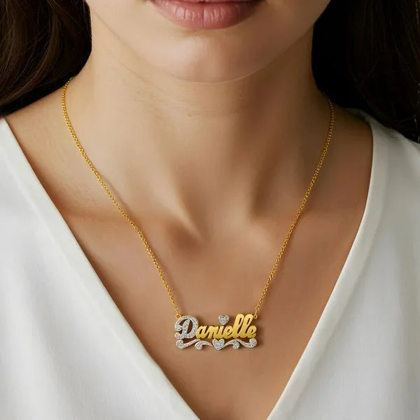 Danielle name necklace worn in 14k yellow gold