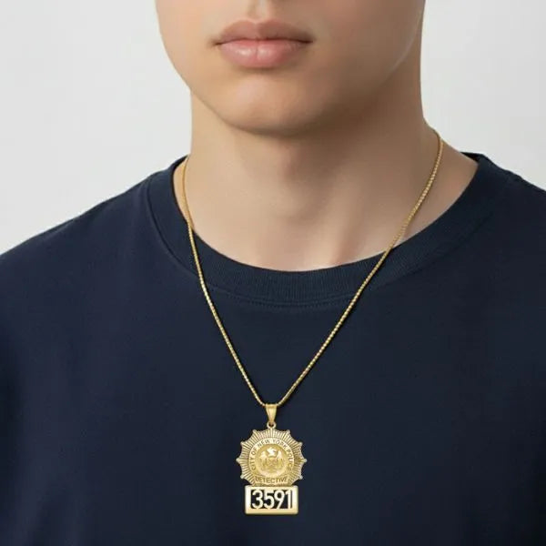 Detective badge pendant worn by teen in yellow gold