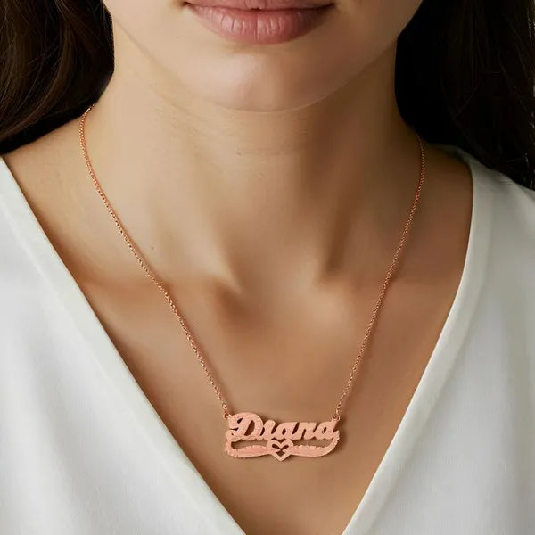 Rose gold Diana name necklace worn on model