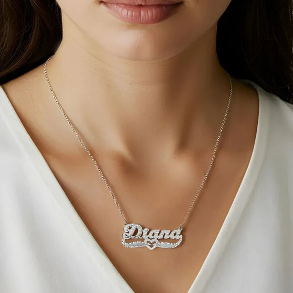 White gold Diana necklace styled with diamond cut detail