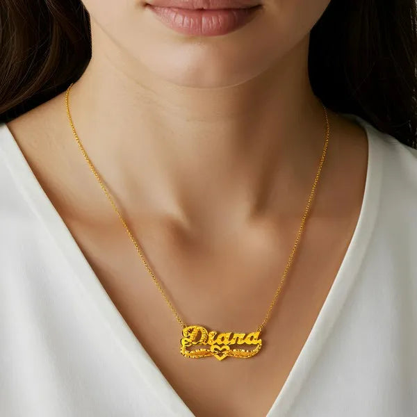 Diana name necklace worn in yellow gold 14k