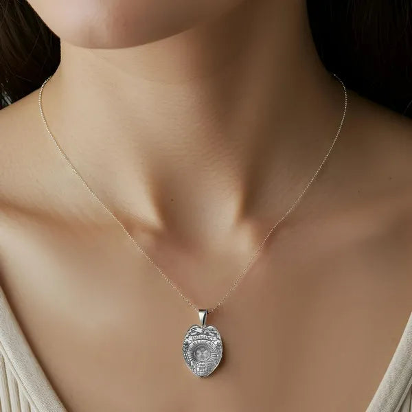 EMT badge charm pendant worn by woman in sterling silver