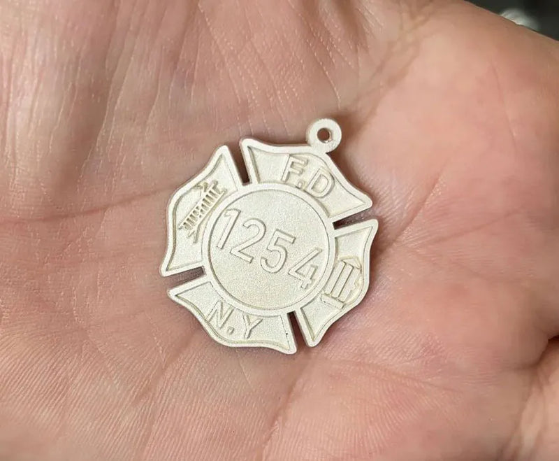Precision Cutting & Engraving: Transforming the Digital Design into Sterling Silver