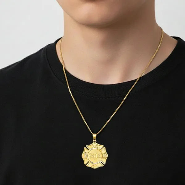Firefighter badge pendant worn by teen in yellow gold