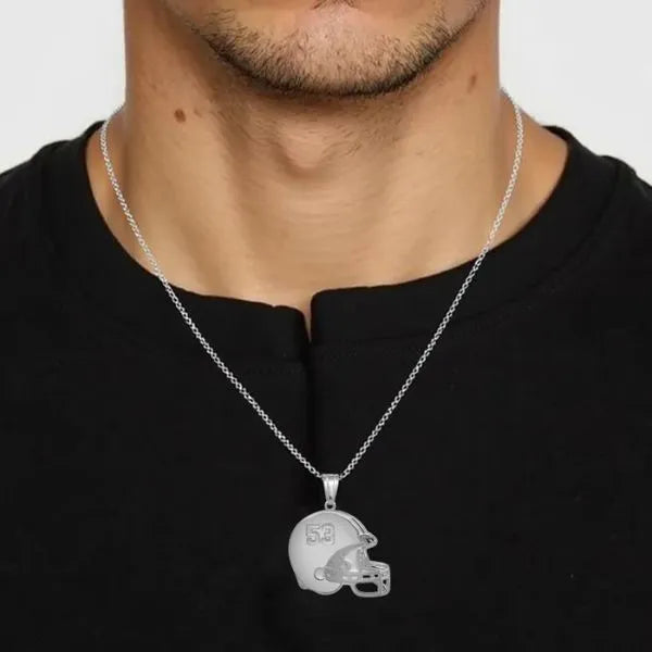 Football helmet pendant worn by man in sterling silver