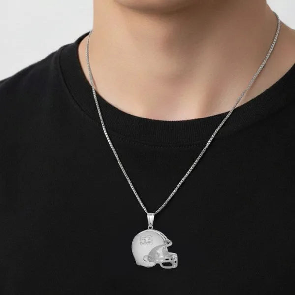 Football helmet pendant worn by teen in sterling silver