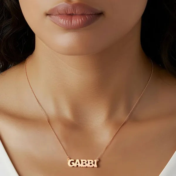 Lifestyle view Gabbi retro letter name necklace rose gold