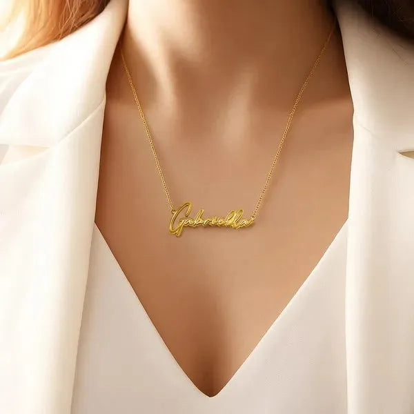 Gabriella 14K Thin Script Name Necklace worn in Yellow Gold