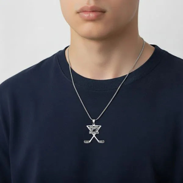 Hockey charm pendant worn by teen in sterling silver