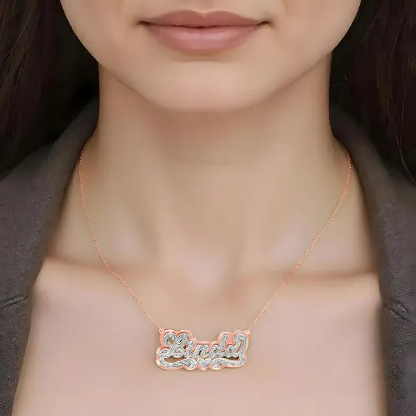 Rose gold Linda name necklace worn on model
