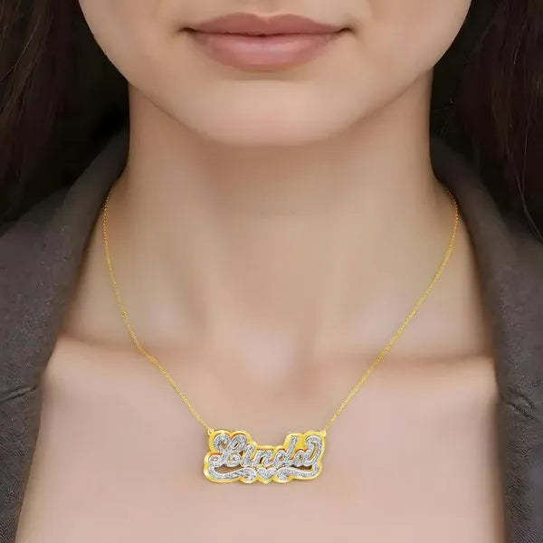 Linda name necklace worn in 14k yellow gold