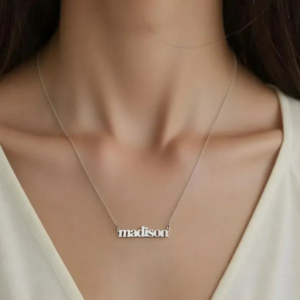 Styled Madison 14 karat bold name necklace white gold