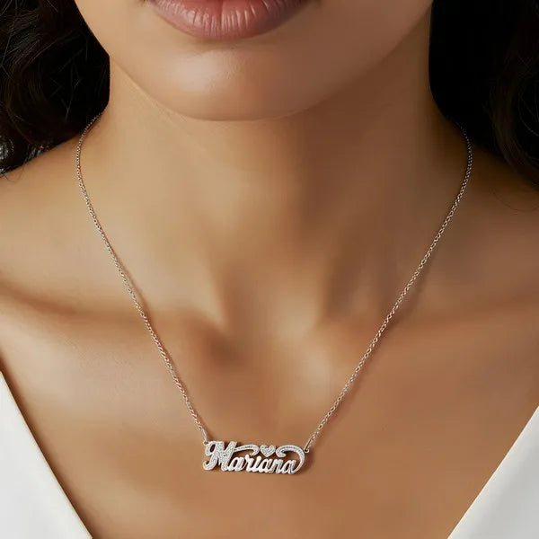Marina name necklace with heart in white gold