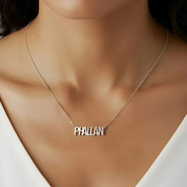 Sterling silver name necklace styled in a thin letter finish
