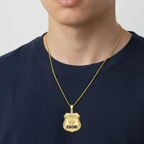 Police badge charm pendant worn by teen model in gold