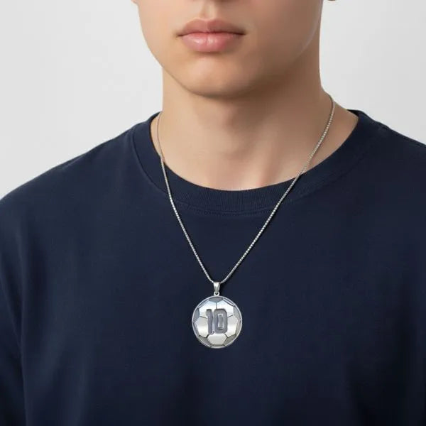 Soccer ball pendant worn by teen in sterling silver