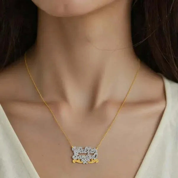 Name necklace worn in 14k yellow gold