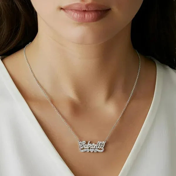 White gold 3D name necklace styled with heart detail