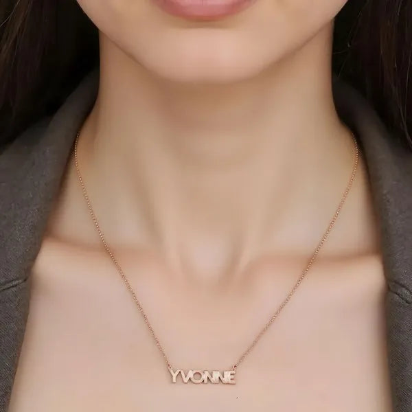 lifestyle shot fluted name necklace rose gold